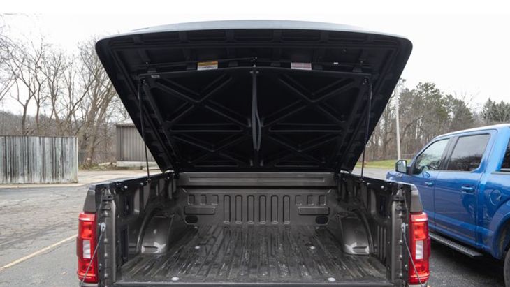 Chevy Silverado truck bed fitted with a secure tonneau cover