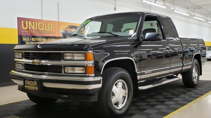 Chevy Silverado Extended Cab side profile parked on pavement