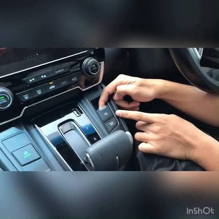 Honda CR-V electric parking brake switch and center console layout