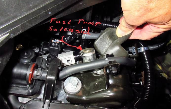 Honda CR-V mechanical fuel pump inspection on a service lift