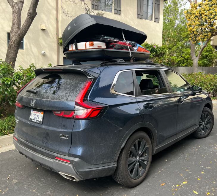 Rooftop cargo basket loaded with adventure gear on a Honda CR-V