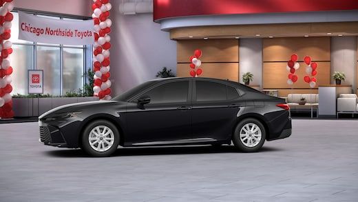 Toyota Camry driving through winter snow conditions near Chicago and Milwaukee
