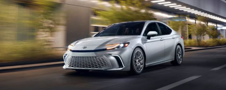 Toyota Camry fuel economy display screen on instrument cluster showing MPG