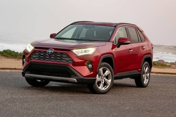 Toyota RAV4 Hybrid display showing fuel efficiency and maintenance alerts